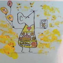 Connie's hand-drawn Art Mouse holding birthday balloons and cake