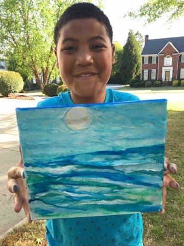 An ocean painting, proudly finished